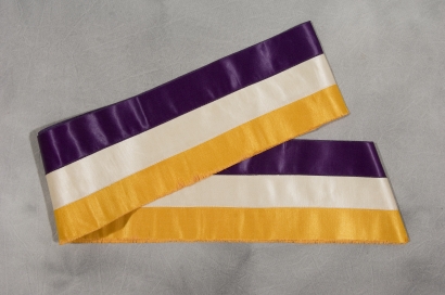 purple, gold, and white women's suffrage sash